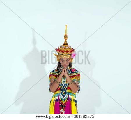 The Beautiful Woman Wearing Thai Tradition Southern Costume And Put Headdress On Her Head,standing O