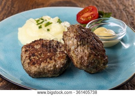 Two Bavarian Meat Loafs On A Plate
