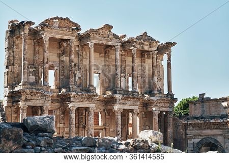 The Ruins Of Celsus Library In Ephesus At Sunny Evening Sun. Beautiful Light Of The Old Ancient Rock