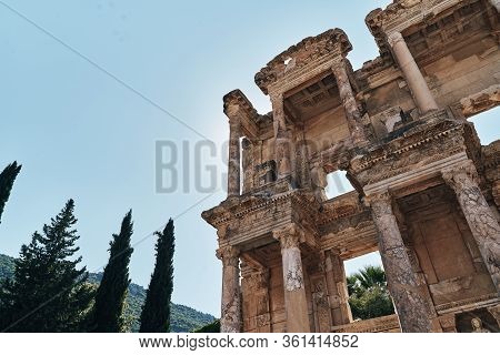 The Ruins Of Celsus Library In Ephesus At Sunny Evening Sun. Beautiful Light Of The Old Ancient Rock