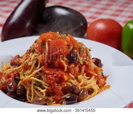 Fresh Pasta Served With Tomato Sauce And Vegetables