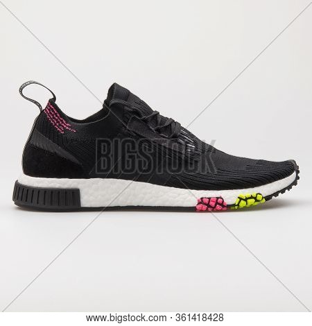 Vienna, Austria - August 24, 2017: Adidas Nmd Racer Pk Primeknit Core Black, Pink And Yellow Sneaker