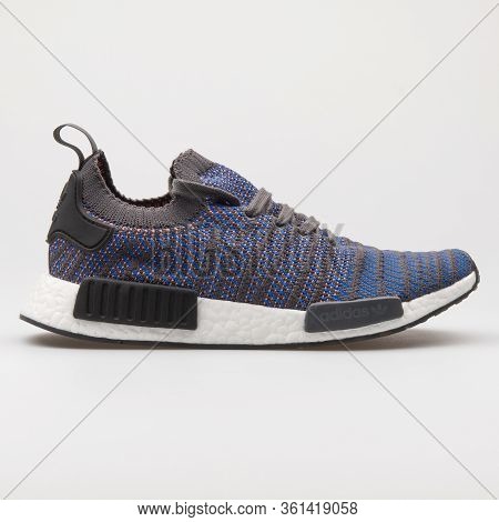 Vienna, Austria - August 24, 2017: Adidas Nmd R1 Grey, Blue And Rose Sneaker On White Background.