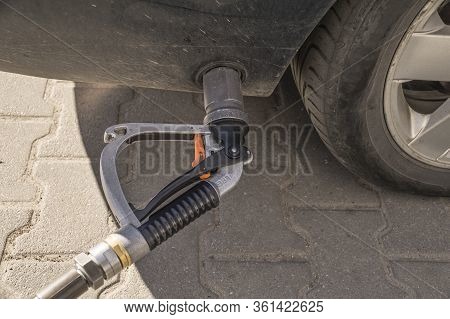 Lpg (liquefied Petroleum Gas) Dispenser. Lpg Refueling Gun Plugged Into The Valve.