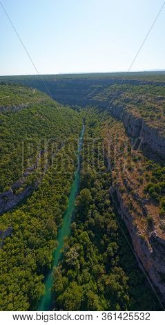Krka River, Aerial View From The Middle Of The Canyon Located In Promina County At Dalmatian Zagora 