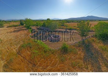 Aerial Stiched Panorama Of The Celtic Well In Dalmatian Hinterland In Promina Municipality In Croati