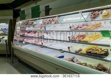 A Guy Checking Out The Meat Section At Publix Where Most Poultry/ Chicken Is Out Of Stock Due To Hig