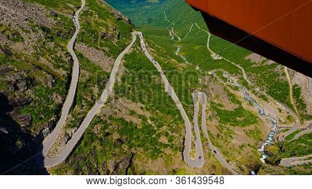 Trolls Path Trollstigen Winding Scenic Mountain Road With Many Cars, Norway Europe. National Tourist