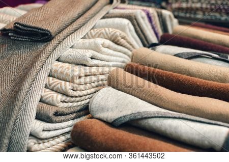 Cashmere Wool Scarves And Wraps With Lines And Square Decoration On A Market Stall