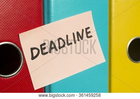 Deadline. Records Management. Thick Folders With Documents On Which A Sticker With Text Is Attached.