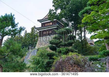 Traditional Japanese Castle On Stone Hill. Ueda Castle Historic Building In Nagano, Japan