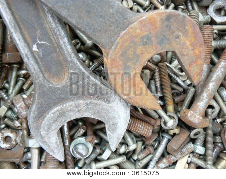 Rusty Metal Fasteners And  Two Wrenchs