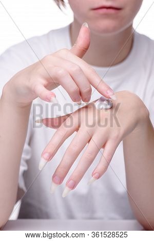 Beautiful Hands Girl On White Background. Beautiful Hands Of Young Woman White Background. Moisturiz