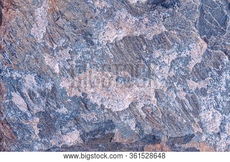 Stone Texture. Structural Surface Close-up. Stone Old Wall.  Granite Natural Surface. Texture Patter