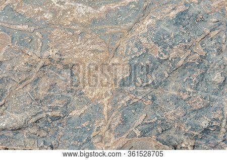 Stone Texture. Structural Surface Close-up. Stone Old Wall.  Granite Natural Surface. Texture Patter