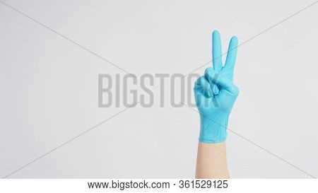 Peace Or Good Luck Sign.it Is Hand Gesturing Two Finger On White Background.