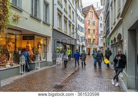 Chur, Switzerland - 21 December 2019 - Locals And Tourists Walk Around The Oldest City In Switzerlan