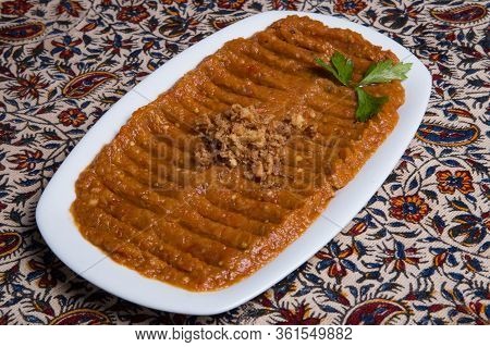 Muhammara Appetizer Of Peppers And Nuts Close-up.