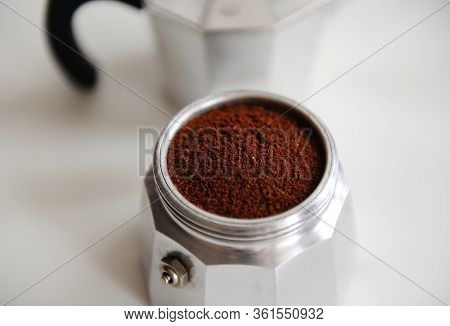 Italian Moka Pot. Ground Coffee In The Basket Close Up