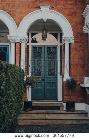 London, Uk - April 12, 2020: Stained Glass Wooden Front Door Of A Traditional Edwardian House In Lon
