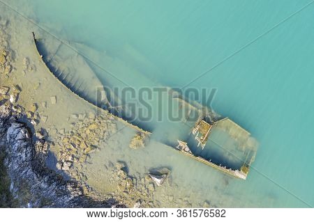 An Aerial View Of The Sinking German Ship Fritz From World War Ii In The Bay Of Salamustica In The R