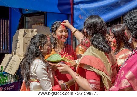 Women Participate In Sindur Khela At A Puja Pandal On The Last Day Of Durga Puja At Baghbazar Sarboj