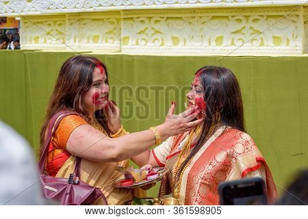 Women Participate In Sindur Khela At A Puja Pandal On The Last Day Of Durga Puja At Baghbazar Sarboj