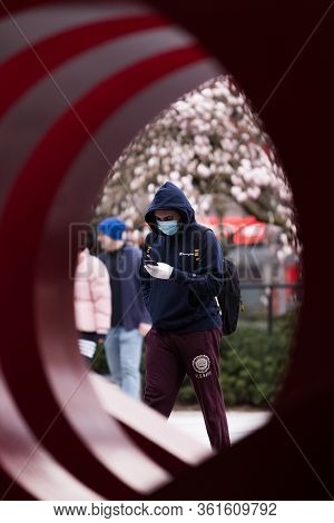 Downtown Vancouver, Bc, Canada - Apr 01, 2020: Pedestrian In Downtown Vancouver Wearing A Medical Fa