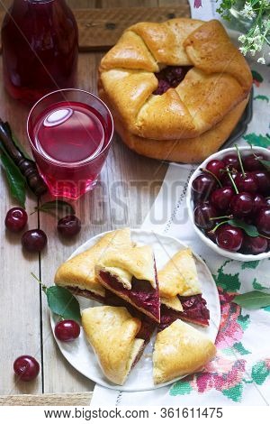 Traditional Homemade Romanian And Moldovan Pies - Placinta, Served With Wine. Rustic Style.