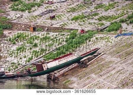 Baidicheng, China - May 7, 2010: Qutang Gorge On Yangtze River. Closeup Of Green With White Boards S