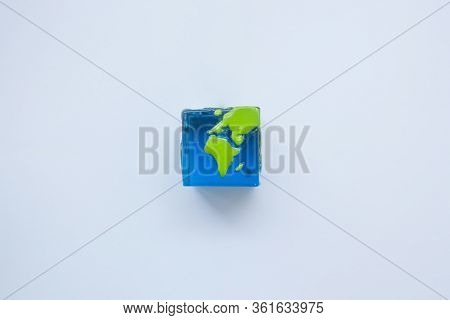 Earth Square Globe On White Background. Mock Up. Flat Lay Composition