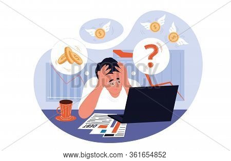 Exhausted Man With Headache Looking Worried At His Laptop While Working At The Office As Financial A