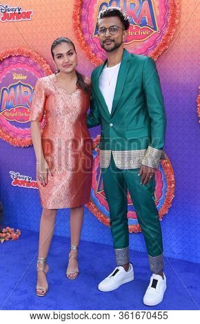 LOS ANGELES - MAR 07:  Leela Ladnier and Utkarsh Ambudkar arrives for âMira, Royal Detectiveâ World Premiere on March 07, 2020 in Burbank, CA