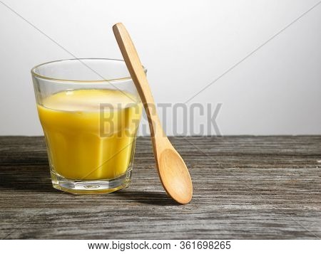 cup of mango puddding on white background ready to eat