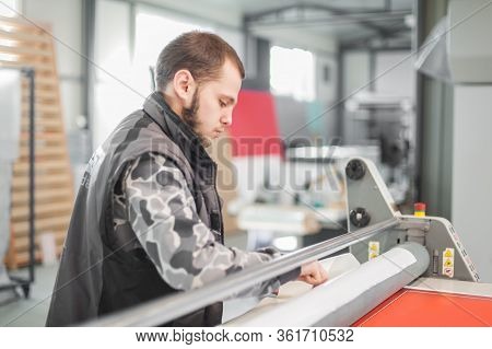 Technician Glue Poster To Foam With Semi Automatic Gluing Machine
