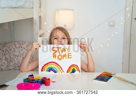 Little Girl With Blond Hair Drew A Rainbow And A Poster Stay Home. Flashmob Chasetherainbow.