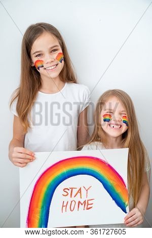 Funny Kid Girls With Blond Hair Drew A Rainbow And A Poster Stay Home. Flashmob Chasetherainbow.