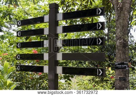 Black Signs, Directional Signs Blank For Labeling. Parks And Gardens. Kuala Lumpur Malaysia.