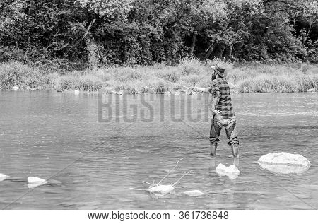 Man Bearded Fisherman. Fisherman Fishing Equipment. Hobby Sport Activity. River Lake Lagoon Pond. Tr