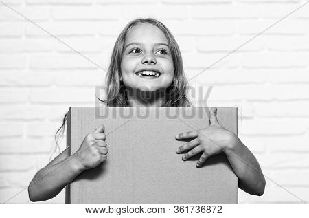 Rent House. Real Estate. Make Moving Easier. Girl Small Child Carry Cardboard Box. Packaging Things.
