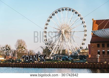 Gdansk, Poland, February 8, 2020. Gdansk Giant 3d Letters Sign With A Ferris Wheel In The Background