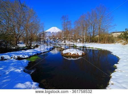 Hotokedojo Pond Snowy And Mount Fuji In Oshino Vollage Yamanashi Japan 04/14/2020