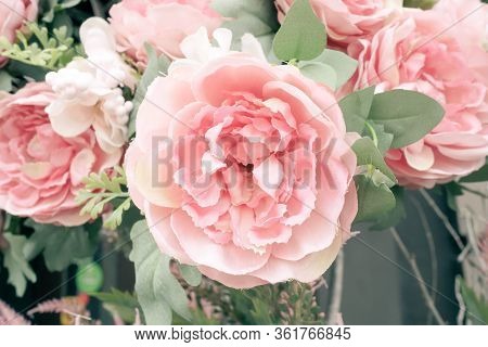 Large Pink Artificial Peonies Flowers On The Wall. Delicate Floral Texture Background For Wedding Sc