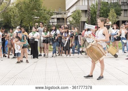 Caba, Buenos Aires / Argentina; March 9, 2020: International Womens Day. Young Woman Activist With A