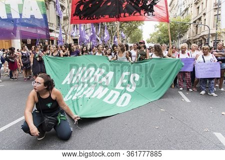 Caba, Buenos Aires / Argentina; March 9, 2020: Womens Day, Group Of Women Marching, Holding A Large 