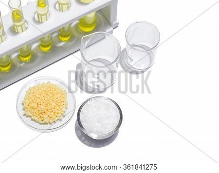 Cosmetic Chemicals Ingredient On White Laboratory Table. Candelilla Wax Sp-75, Microcrystalline Wax 