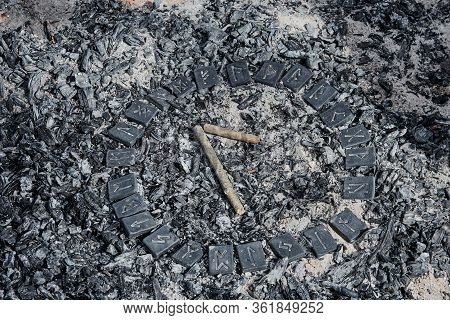 Norse Rune Laguz On Ashes Backgorund Inside The Circle Of 24 Norse Runes