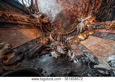 Feb 2, 2020 - Munich, Germany: Upward View Of St Peter Petrus Statue With Two Angels In Entrance Hal