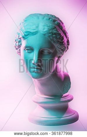 Statue Of Venus De Milo. Creative Concept Colorful Neon Image With Ancient Greek Sculpture Venus Or 