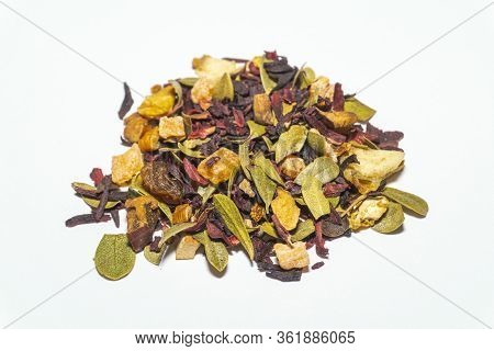 Black Fruit Tea With Various Dry Fruits Photo